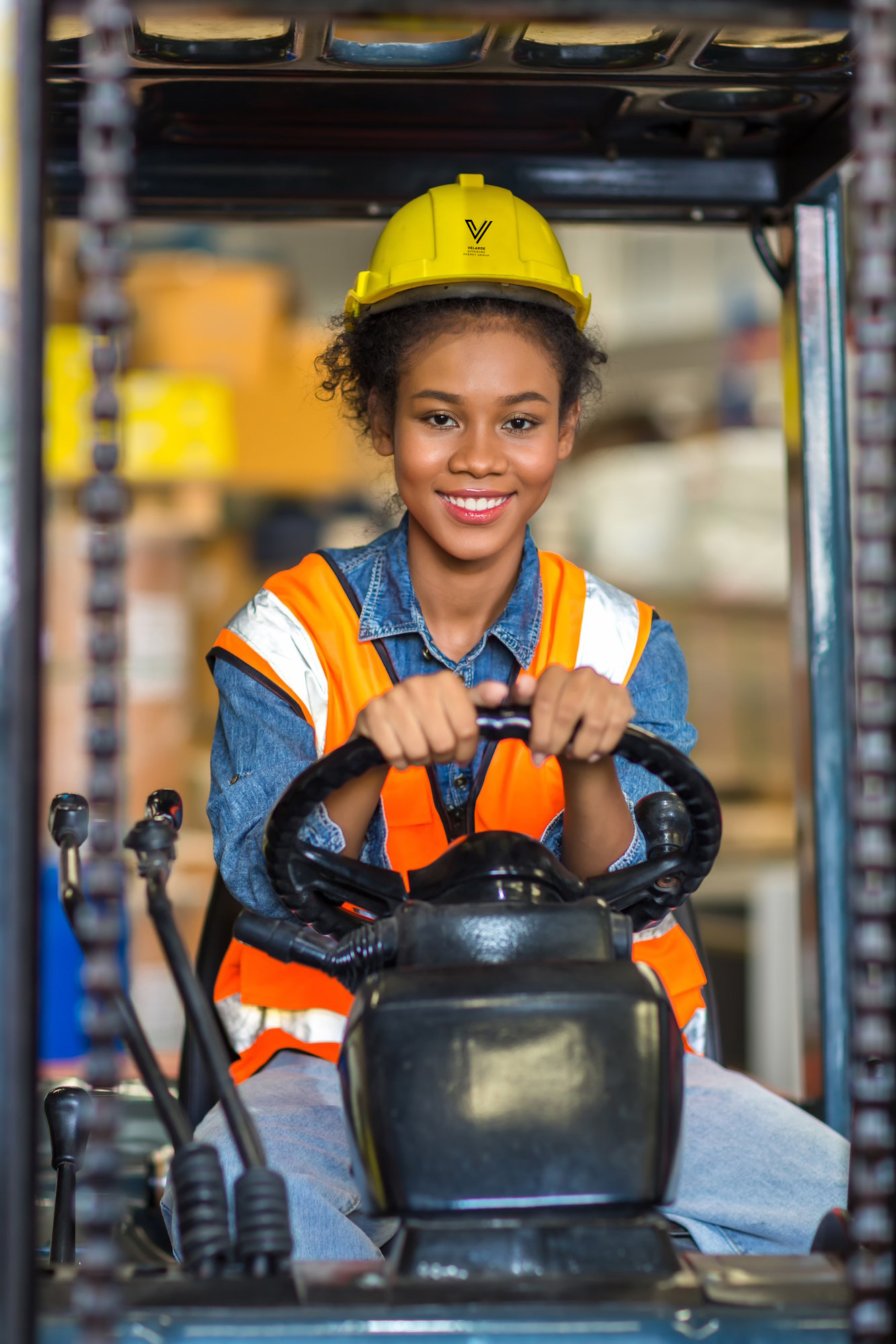 women-worker-at-forklift-driver-happy-working-in-industry-factory-logistic-ship-